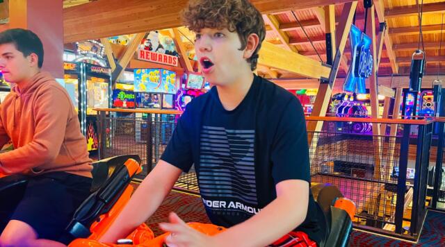 teens enjoying arcade games at Big Al's.